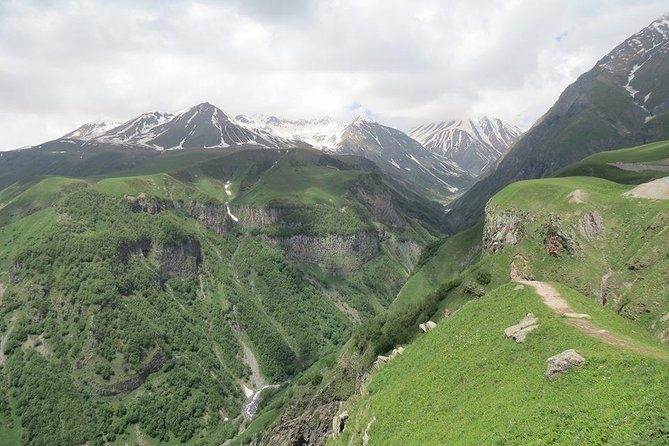 Caucasus mountains full day Private Tour Ananuri-Gudauri-Kazbegi - Ananuri Fortress and its mountain setting