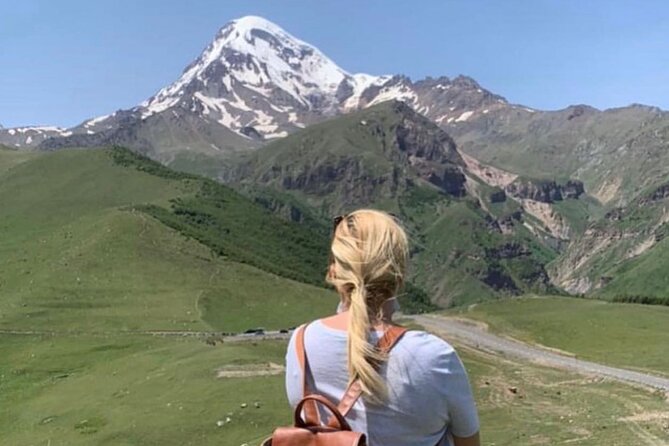 Day tour to mountains Jinvali lake, Ananuri, Kazbegi, Arch friendship - The Friendship Monument above Devil’s Valley