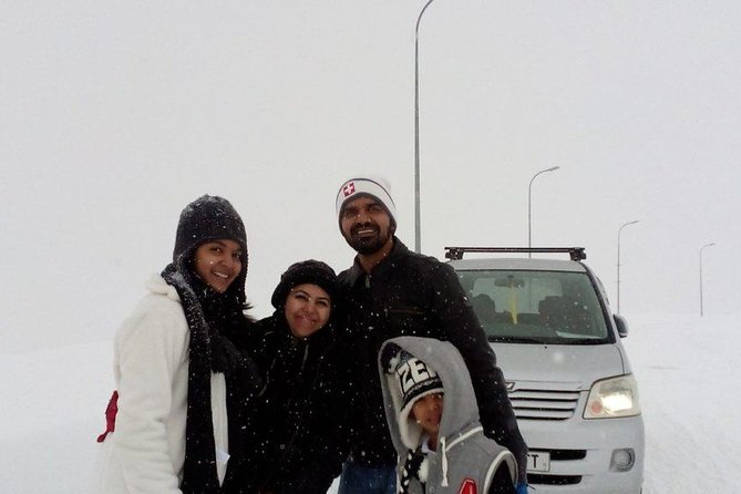 Day trip to Gudauri ski resort - Ananuri Fortress: stone walls beside the road