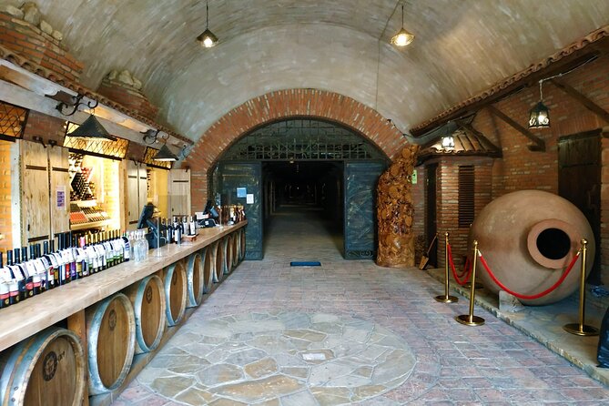 Kakheti Wine Tour with 20+ Wine Tastings & Qvevri Masterclass - Walking through Khareba’s 7-kilometer wine tunnel