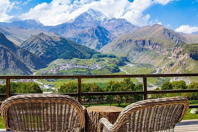 Kazbegi Full-Day Private Tour with Scenic Stops from Tbilisi - Ananuri Fortress adds history to the mountain scenery