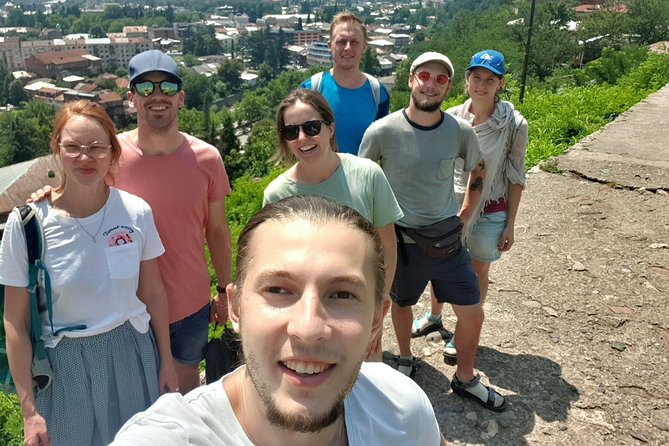 Kutaisi Walking Tour - Crossing the Chain Bridge toward the river