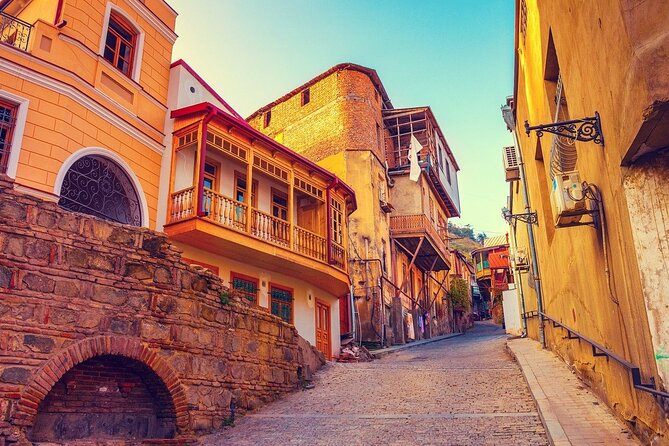 Old Tbilisi Tour: Private Walking Tour With Wine Tasting - Walking down through Abanotubani