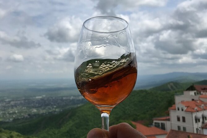 Private Wine Tour In Kakheti Region with 7 Wines and Lunch - Manavi begins the tasting with homemade wine and chacha