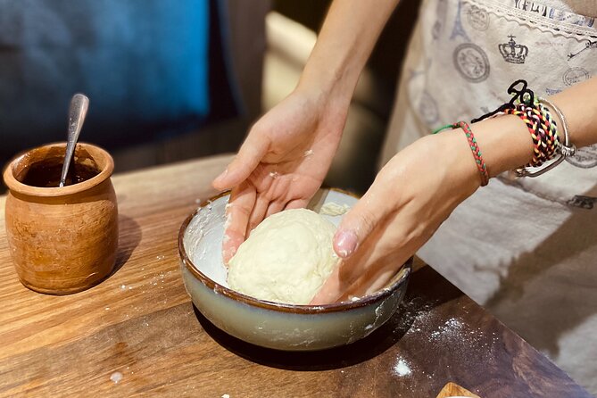 Small-Group Khinkali and Khachapuri Cooking Class in Tbilisi - Folding khinkali with the chef’s tips
