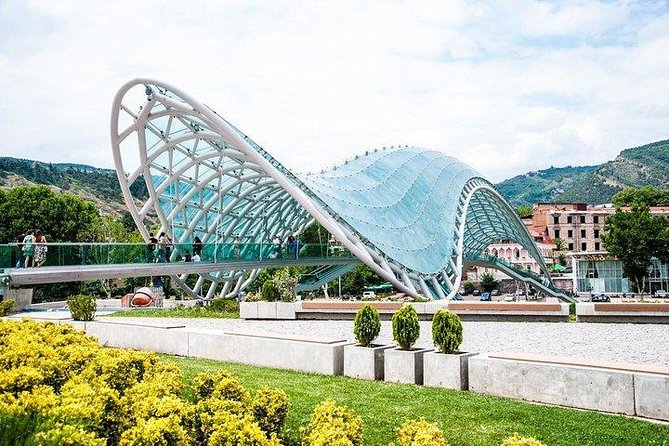 Tbilisi City Tour - The Bridge of Peace links modern Tbilisi with the park