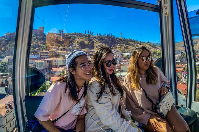 Tbilisi Walking Tour Including Cable Car and Traditional Bakery - Returning across the Bridge of Peace