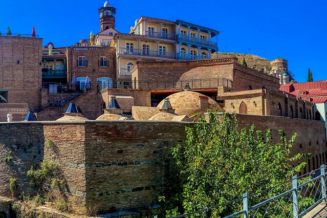 Tbilisi Walking Tour Including Cable Car and Traditional Bakery - The leaning clock tower and Tbilisi’s playful side